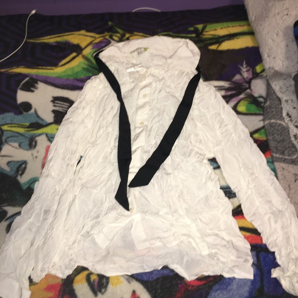 White button down shirt with black wrap on caller